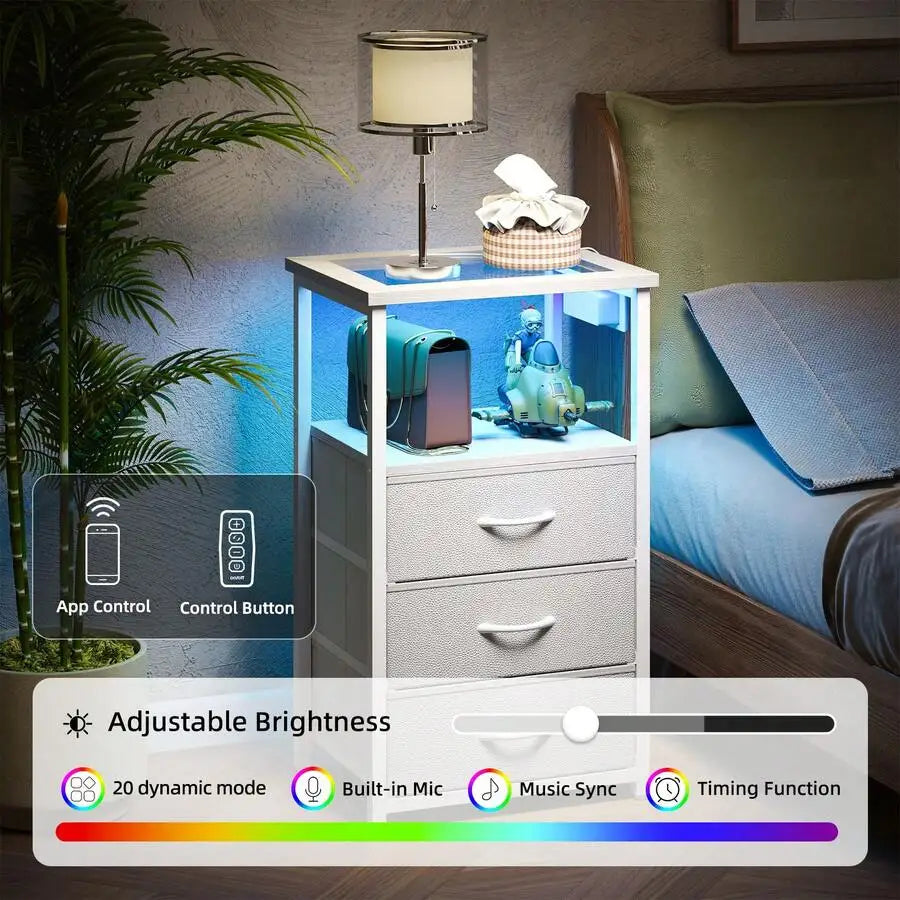 Tomnk Bedside Table With Charging Station, LED Nightstand With USB Ports And Outlets, 3 Fabric Storage Drawers With PU Finish, Bed Side Table For Bedroom, Living Room, White/Black